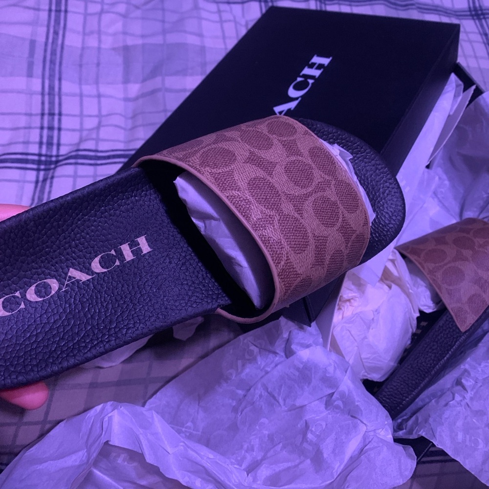 I am selling coach slides size 9.5 in women